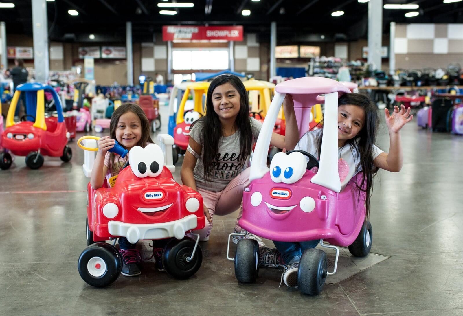 smiling kids in cozy coupe ride on cars